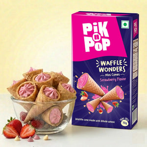 Strawberry mini waffle cones in a glass bowl beside Pik n Pop Waffle Wonders strawberry flavor box.