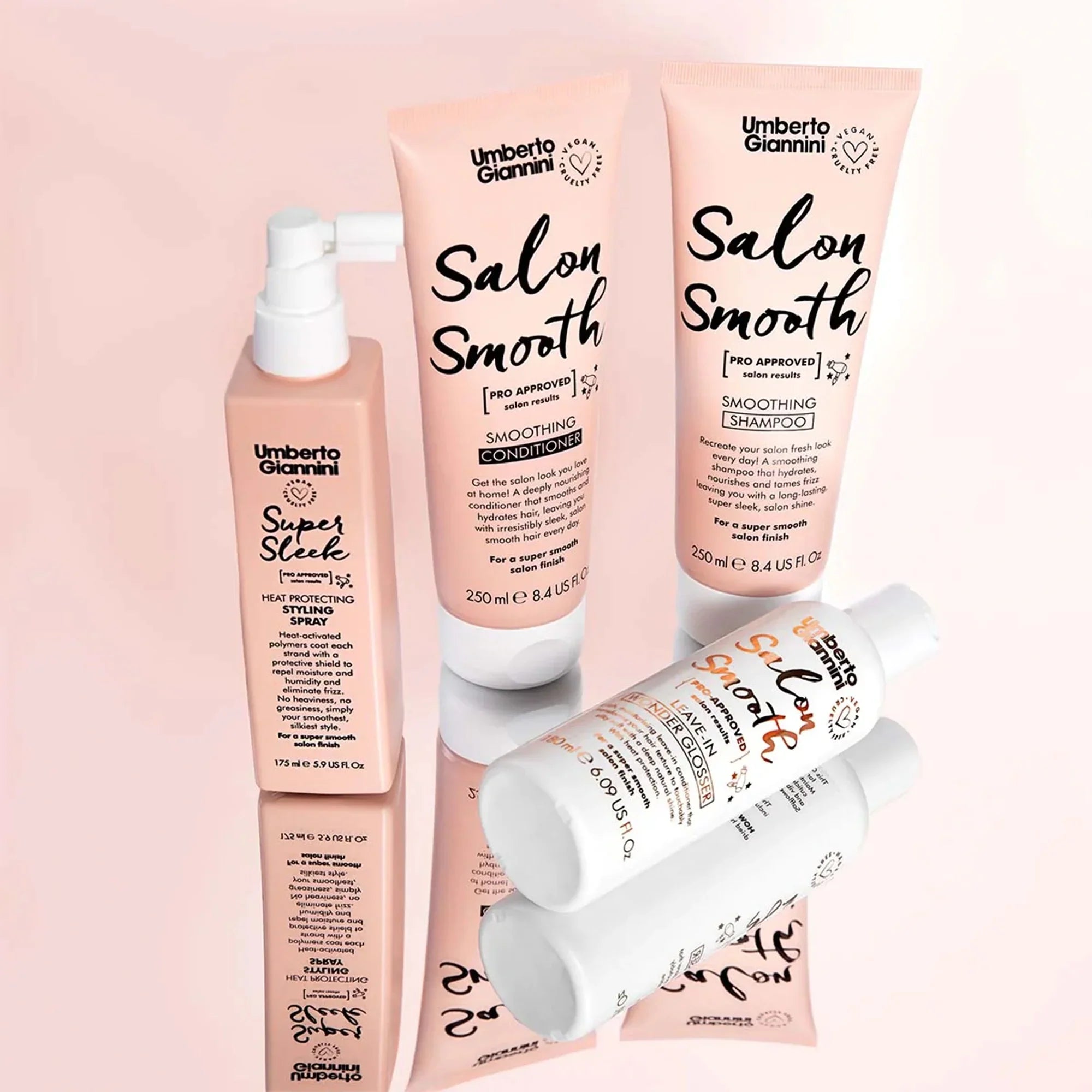 Umberto Giannini Salon Smooth hair care set including smoothing shampoo, conditioner, heat protecting styling spray, and leave-in shimmer gloss