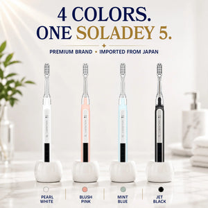 Four Soladey 5 toothbrushes in Pearl White, Blush Pink, Mint Blue, and Jet Black colors.