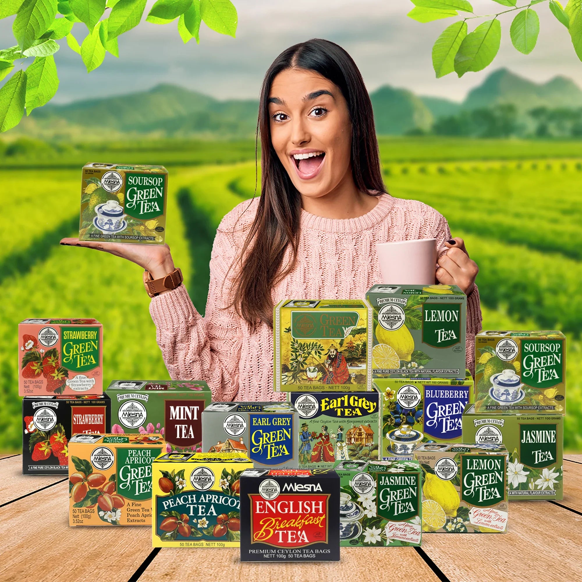 Woman holding soursop green tea box with assorted tea boxes in a lush tea garden setting