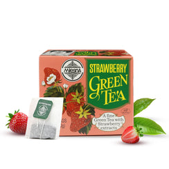Strawberry green tea box with tea bag, fresh strawberries, and green tea leaves