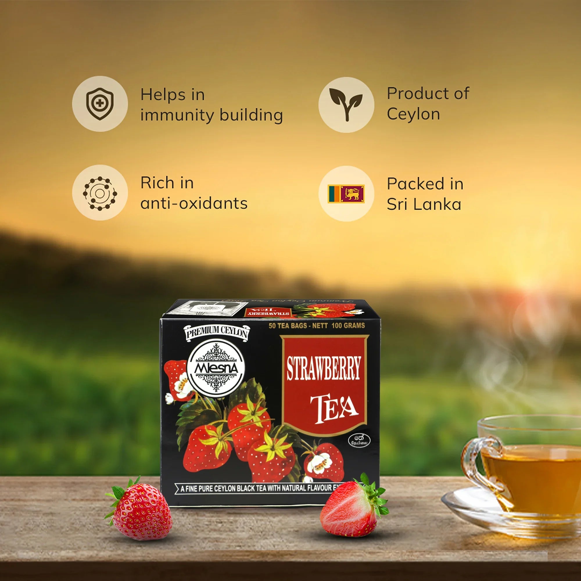 Box of strawberry tea with fresh strawberries and glass cup, Ceylon tea health benefits highlighted