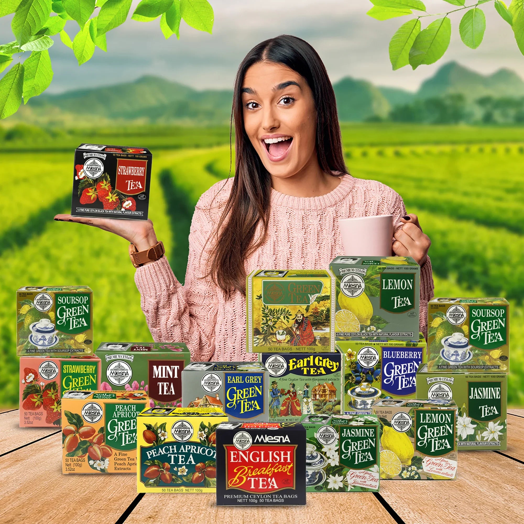 Woman in a tea plantation holding a box of strawberry tea surrounded by assorted tea boxes