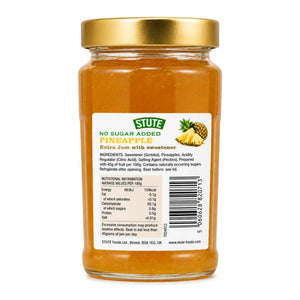 Jar of Stute No Sugar Added Pineapple Jam with a gold lid on a white background