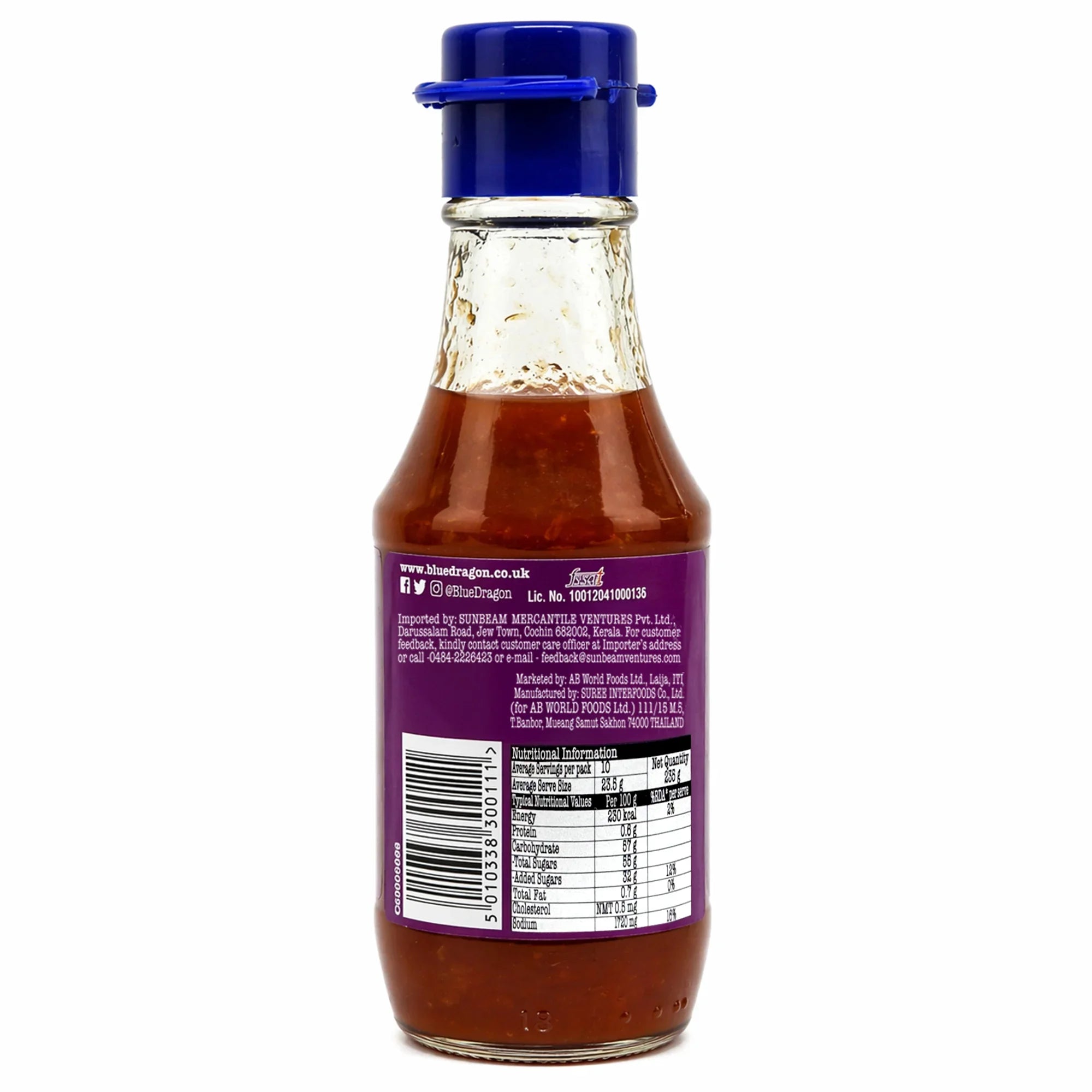 Glass bottle of sweet chilli sauce with purple label and blue cap, showing nutritional info.