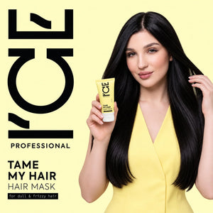 Woman with sleek black hair holding a yellow ICE Professional Tame My Hair Hair Mask tube.