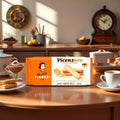 Vicenzi Vicenzovo Italian ladyfinger biscuits pack on wooden table with coffee, dessert, and kitchen background