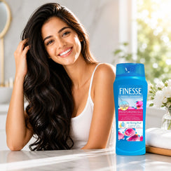 Finesse Moisturizing 2-in-1 Shampoo + Conditioner with Hyaluronic Acid for soft, manageable hair